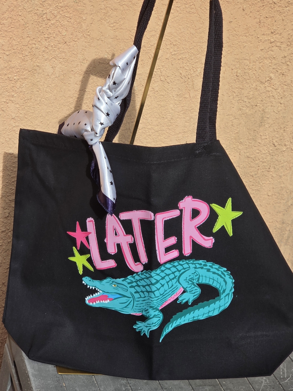 Black Tote Bag with Turquoise Crocodile and Pink "Later" Graphic